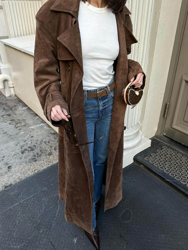 Warm women's elegant faux suede winter jacket, versatile for cold weather chic.