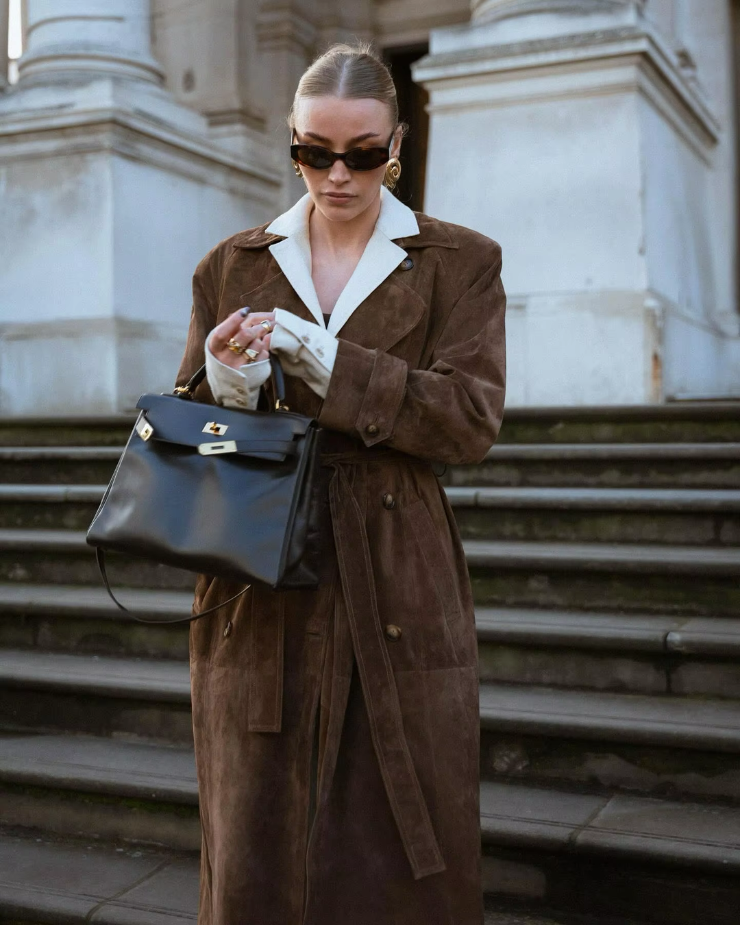 Warm women's faux suede winter coat, neutral shade, versatile for cold weather outerwear.