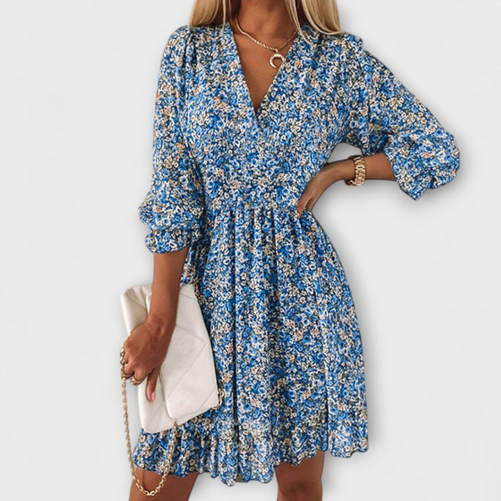 Blue floral puff sleeve A-line midi dress for women, ideal for brunch or elegant summer events.