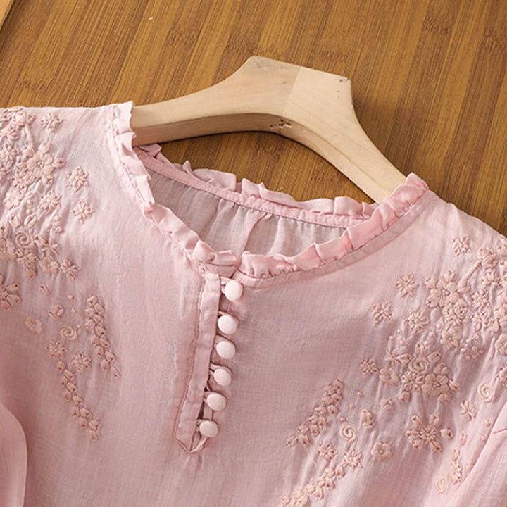 Classic women's long sleeve floral button-front blouse, an elegant and versatile top.