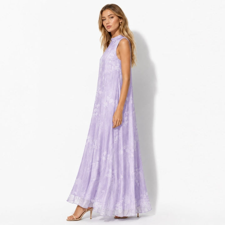 Flowy women's maxi dress with a beautiful floral print and chic high neck for evening events.