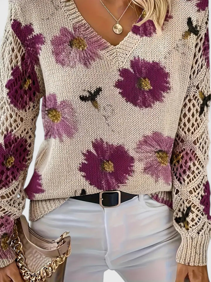 Stylish women's knit cardigan with delicate floral pattern; ideal for casual everyday wear.