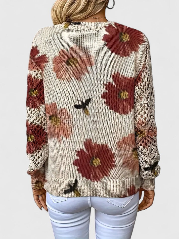 Women's elegant knit cardigan with beautiful floral design; perfect for sophisticated layering.