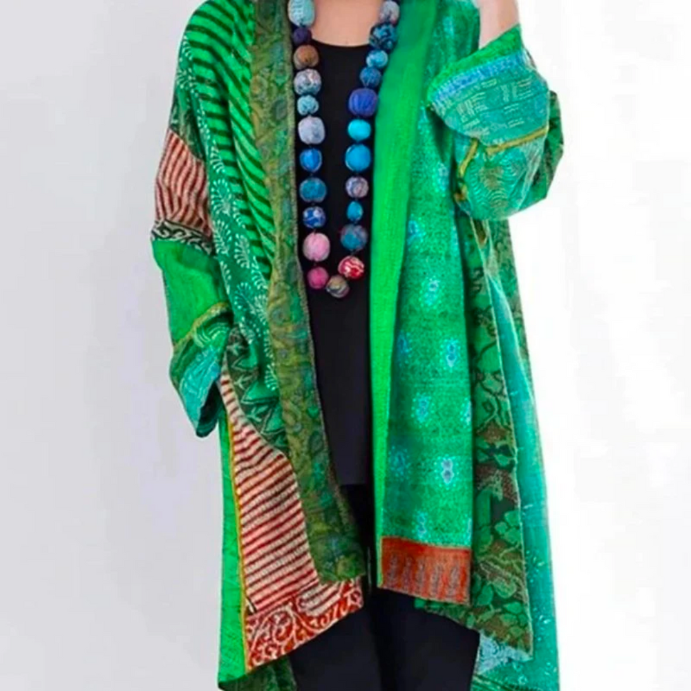 Comfortable women's floral knit vest. Lightweight, soft, and colorful for elegant spring fashion.