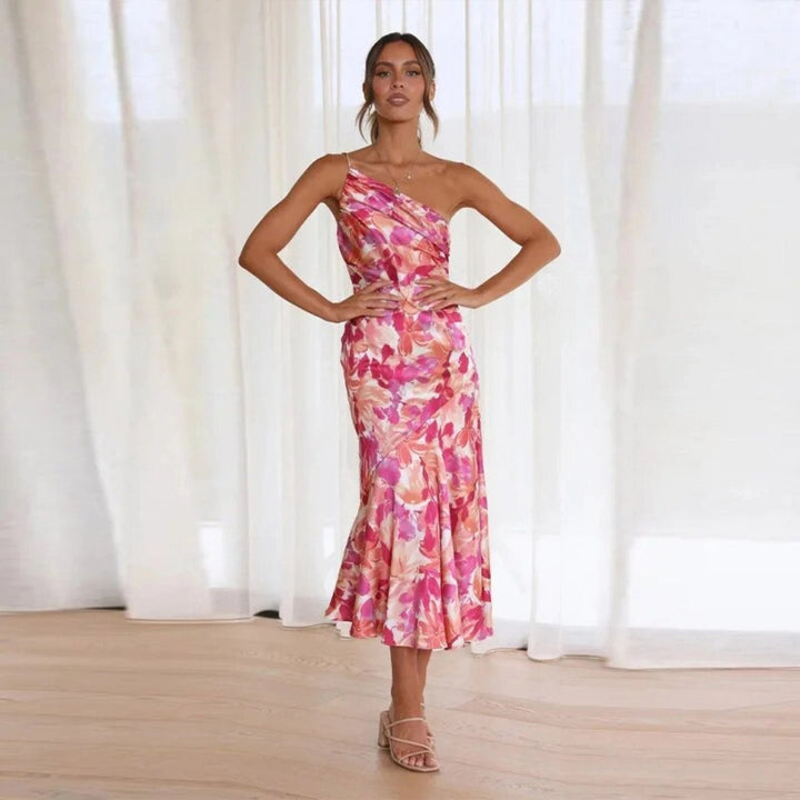 Flattering women's floral midi dress with a stylish one-shoulder design, ideal for guests.