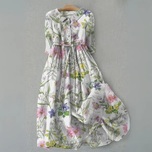 Women's elegant floral print trapeze dress with buttons for summer. Flowy, comfortable daywear & vacation style.