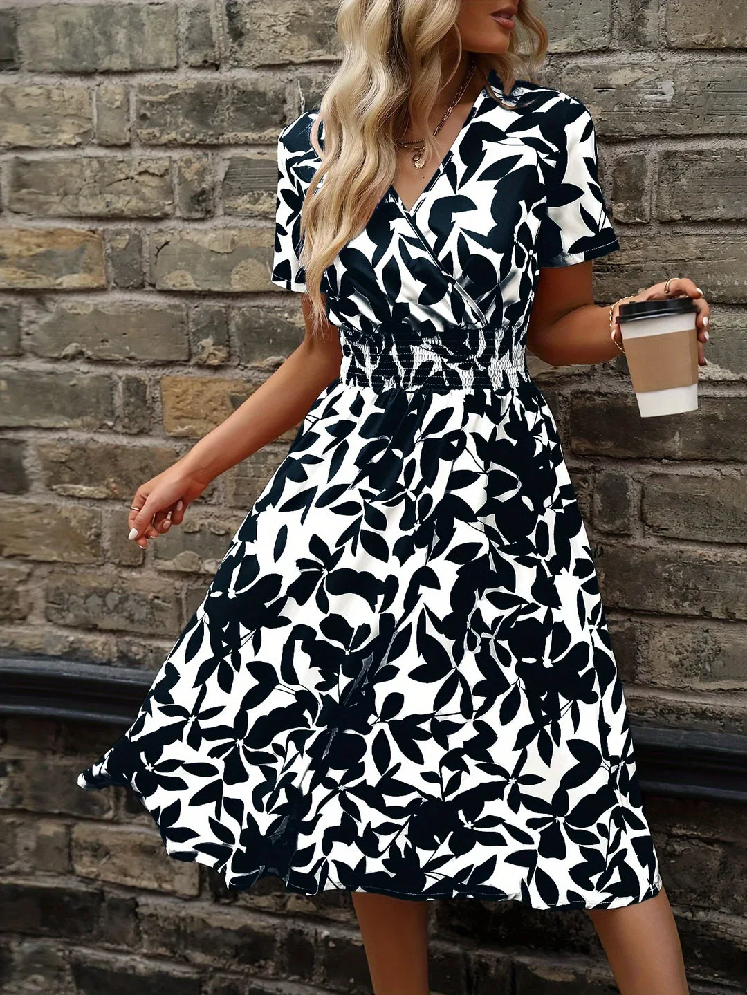 Women's elegant floral wrap midi dress, perfect for spring & summer occasions.