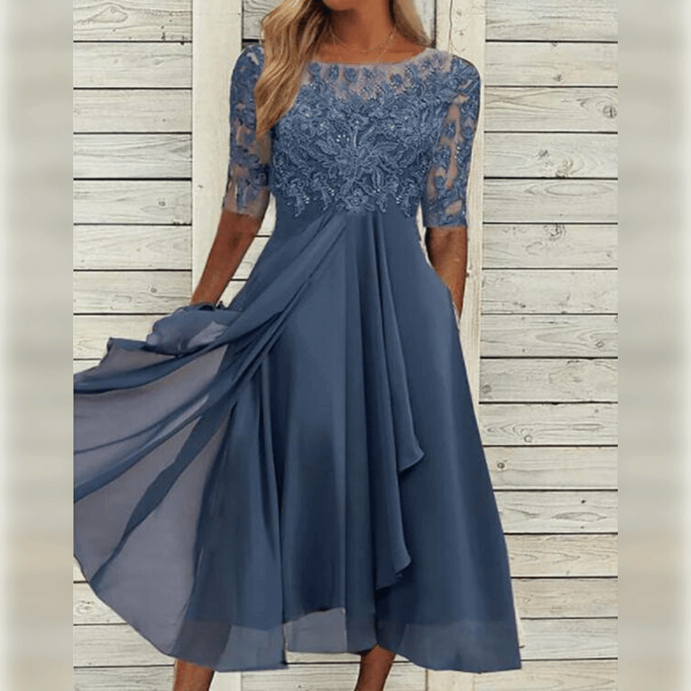 Women's elegant flowing lilac dress. Perfect for parties, special events & chic comfort.