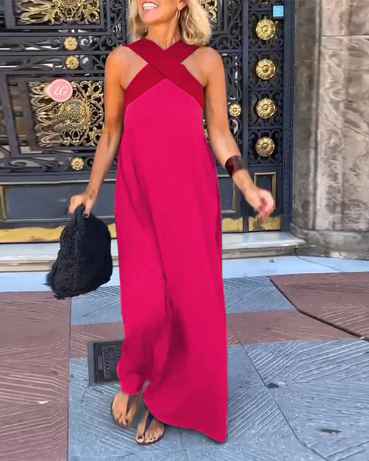 Full-length view of women's flowy cross neck maxi dress, long and elegant for summer parties.