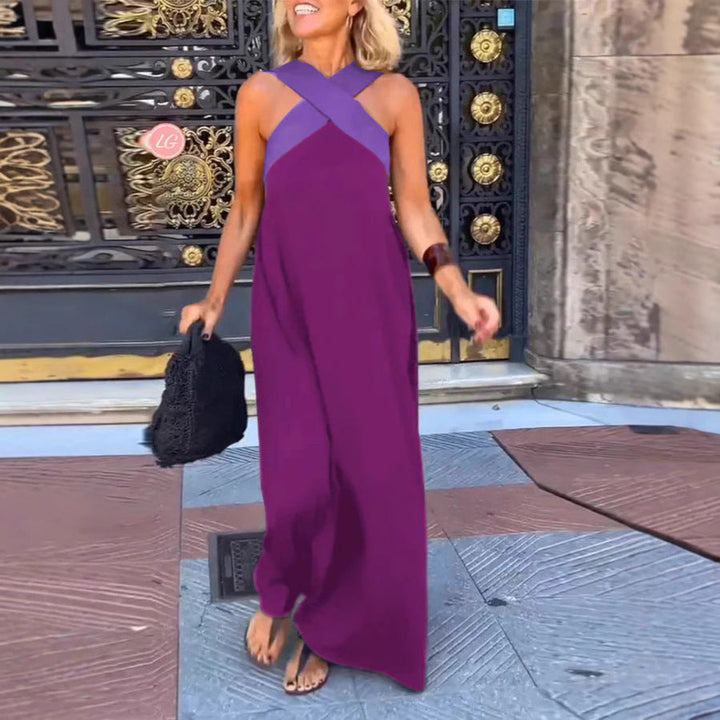 Comfortable women's maxi dress with cross neck, elegant and versatile for evening or casual wear.