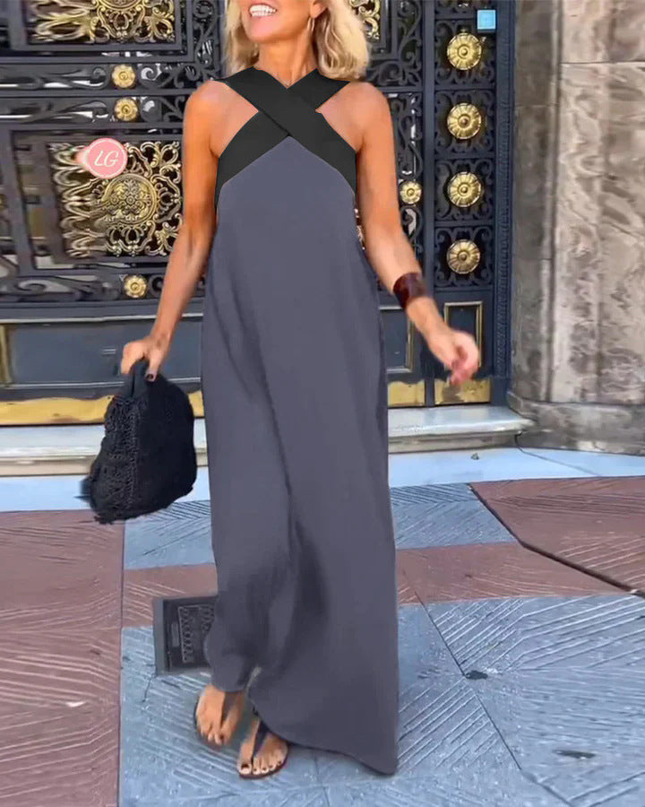 Elegant women's long maxi dress with cross neck, perfect for a chic evening party.
