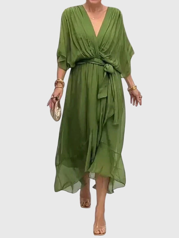 Women's elegant flowy maxi dress, perfect for summer occasions and versatile styling.