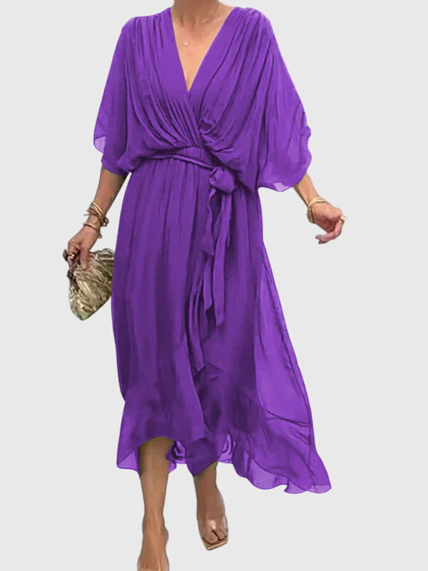 Women's V-neck elegant maxi dress with a flowy silhouette, great for summer parties.