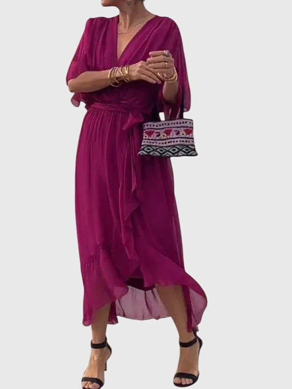 Women's elegant flowy V-neck maxi dress, versatile for summer, party, or special occasion.