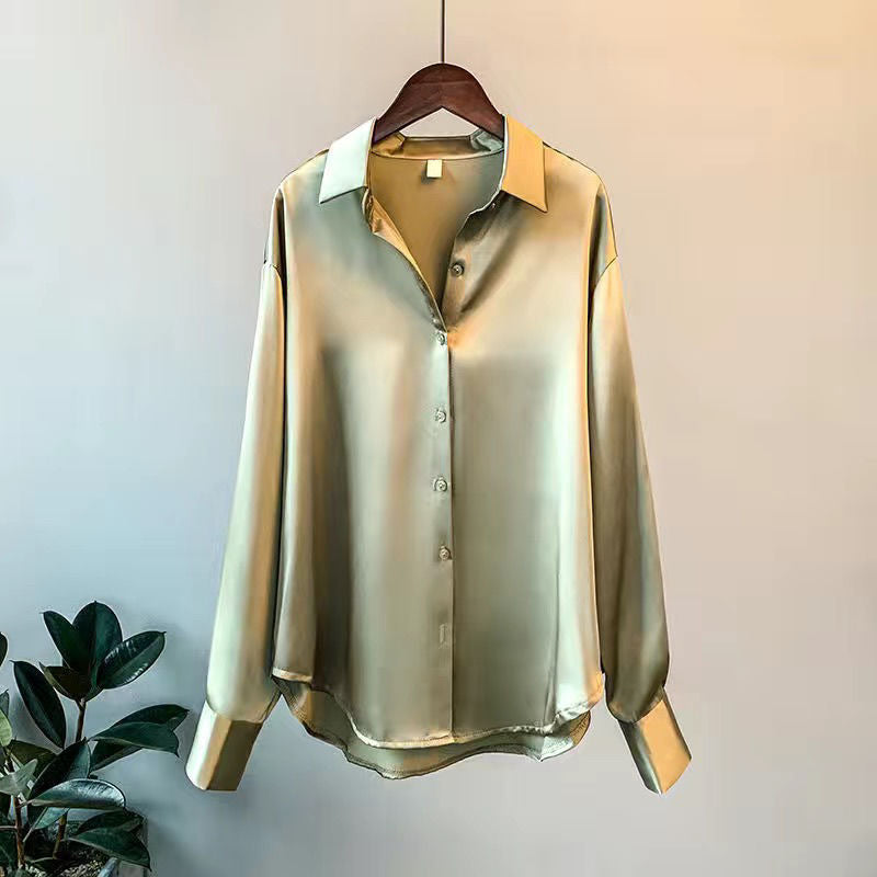 Elegant women's sophisticated ruffle blouse. A chic, fashionable long-sleeve top for modern wardrobes.