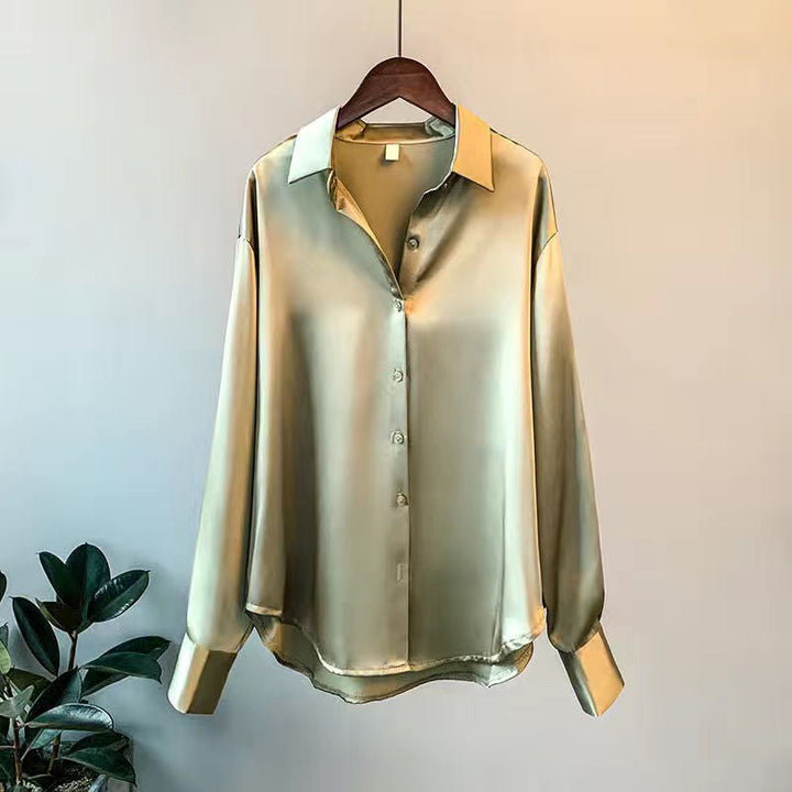 Elegant women's sophisticated ruffle blouse. A chic, fashionable long-sleeve top for modern wardrobes.