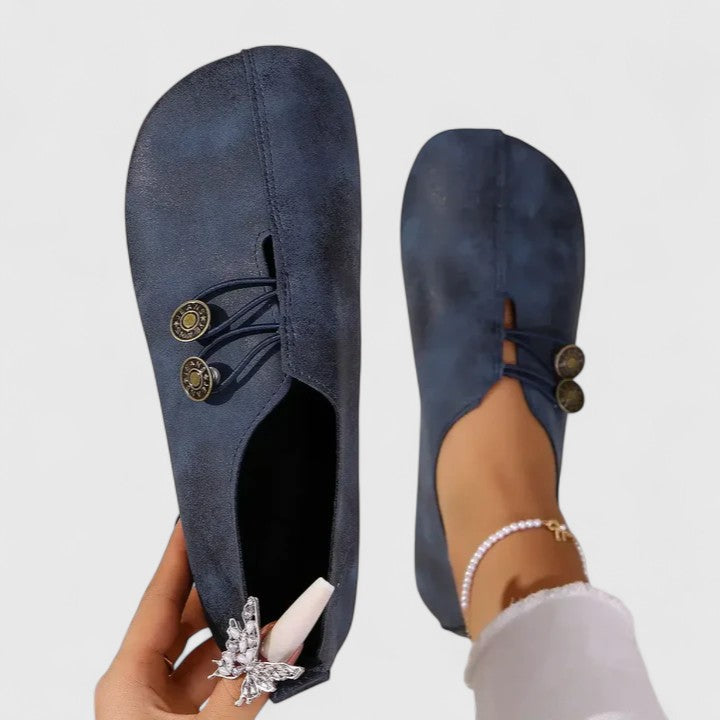 Stylish women's slip-on loafers, foldable for portability, with an elegant design and secure elastic button.