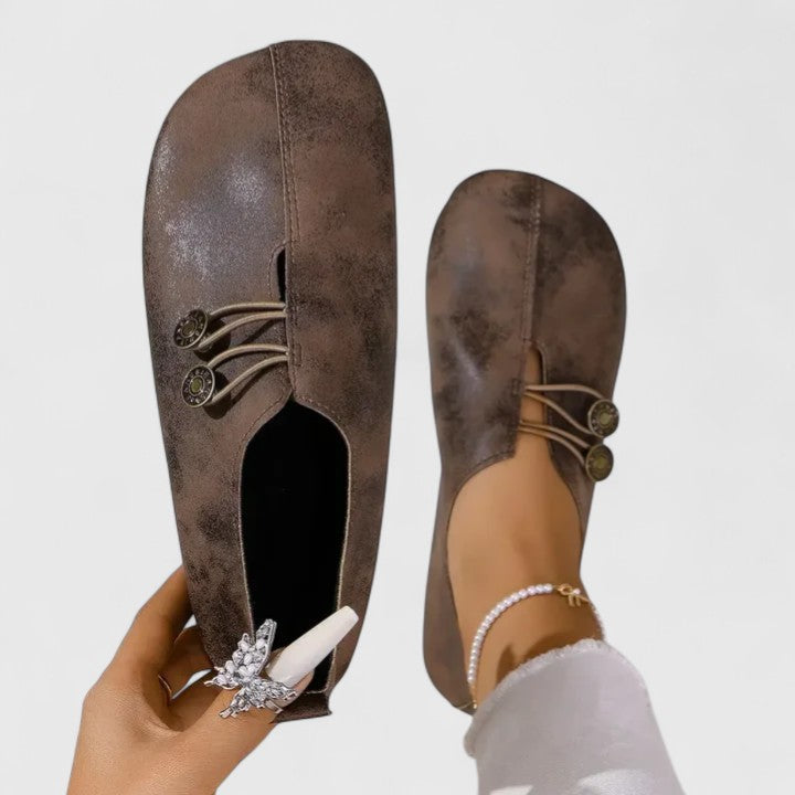 Versatile women's foldable loafers, great for travel & daily wear with elastic button closure & padded comfort.