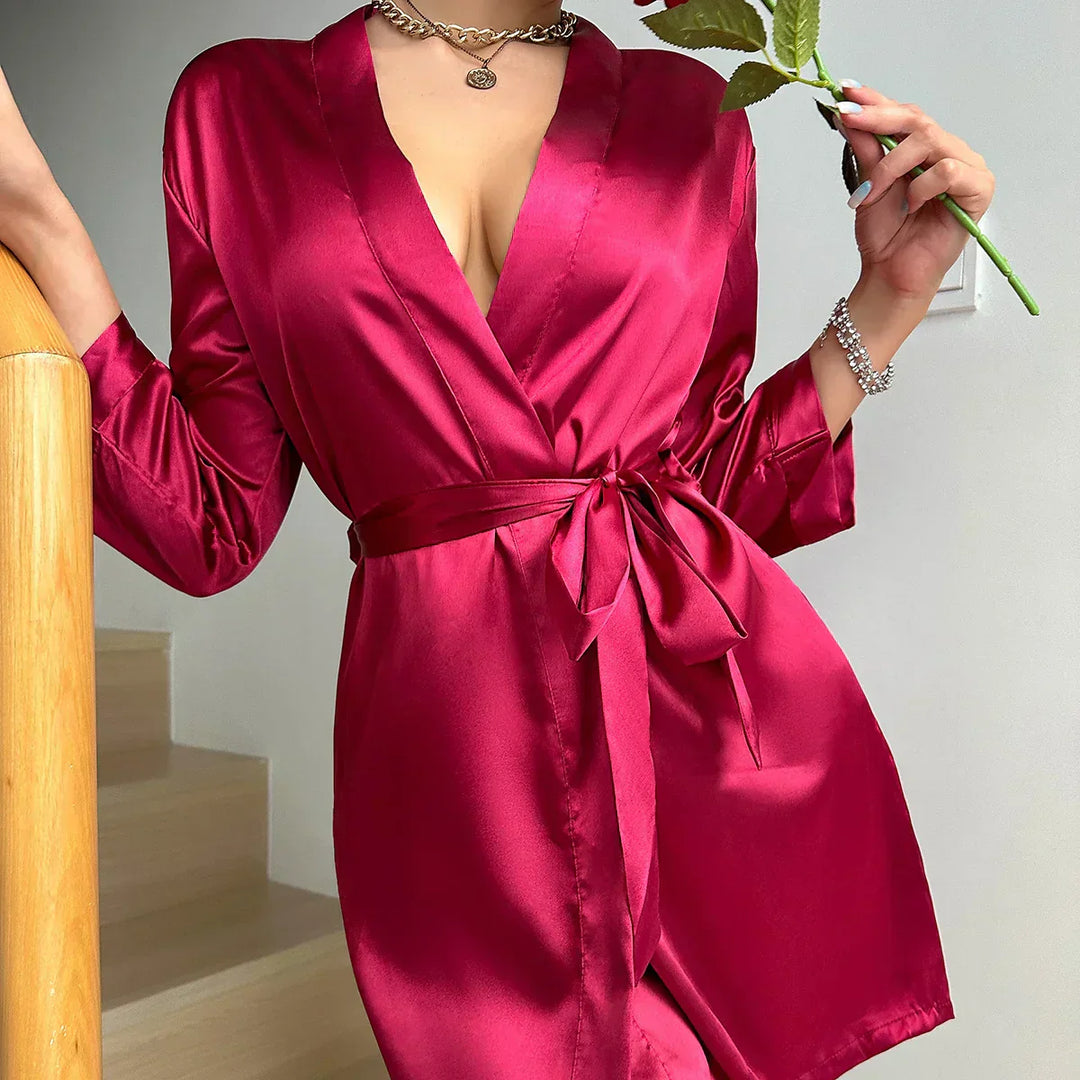Soft Noémie Glacé Silk loungewear dress for women; elegant, relaxed fit with stylish lace-up front. Ideal nightwear.