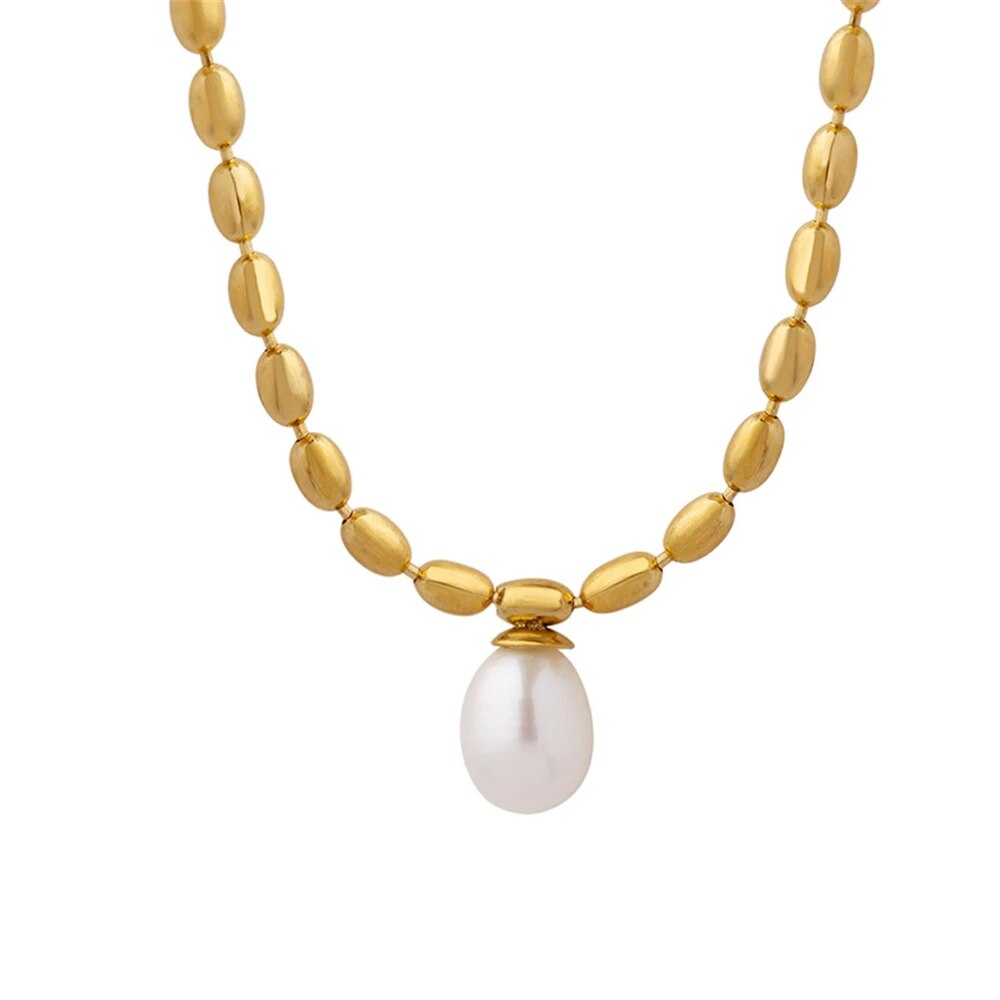 Delicate gold pearl necklace for women. Elegant beaded jewelry, a timeless and classic accessory.