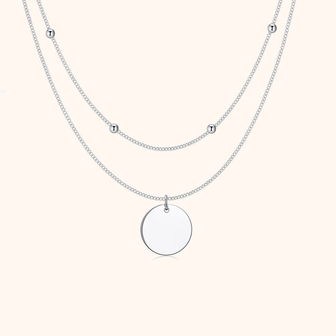 Women's elegant gold plated double medallion layered necklace. Dainty chic silver jewelry accessory for fashion.