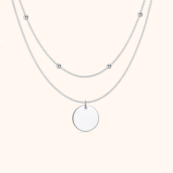 Women's elegant gold plated double medallion layered necklace. Dainty chic silver jewelry accessory for fashion.