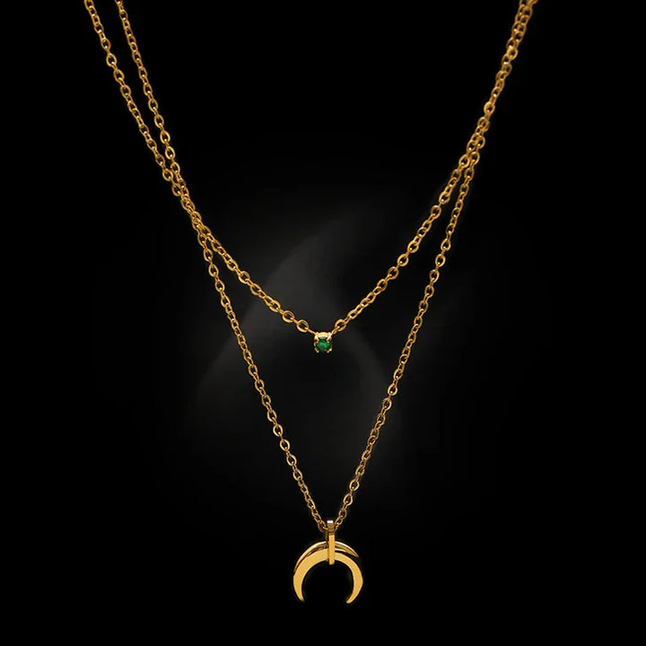 Women's elegant green diamond double crescent moon necklace. Vintage style layered jewelry accessory.