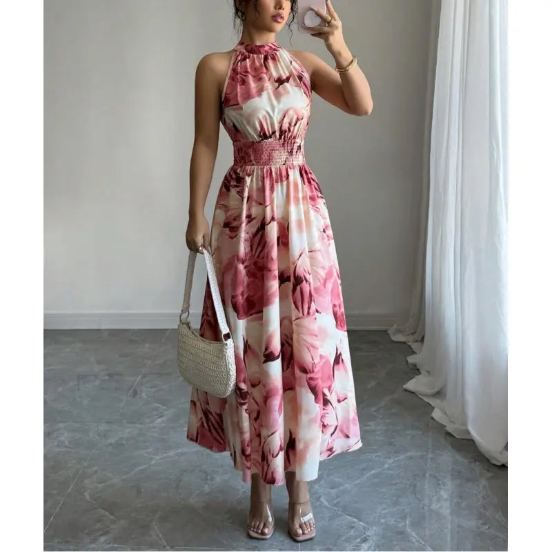 Comfortable women's long halter dress with smocked waist, an elegant choice for summer, beach, or casual parties.