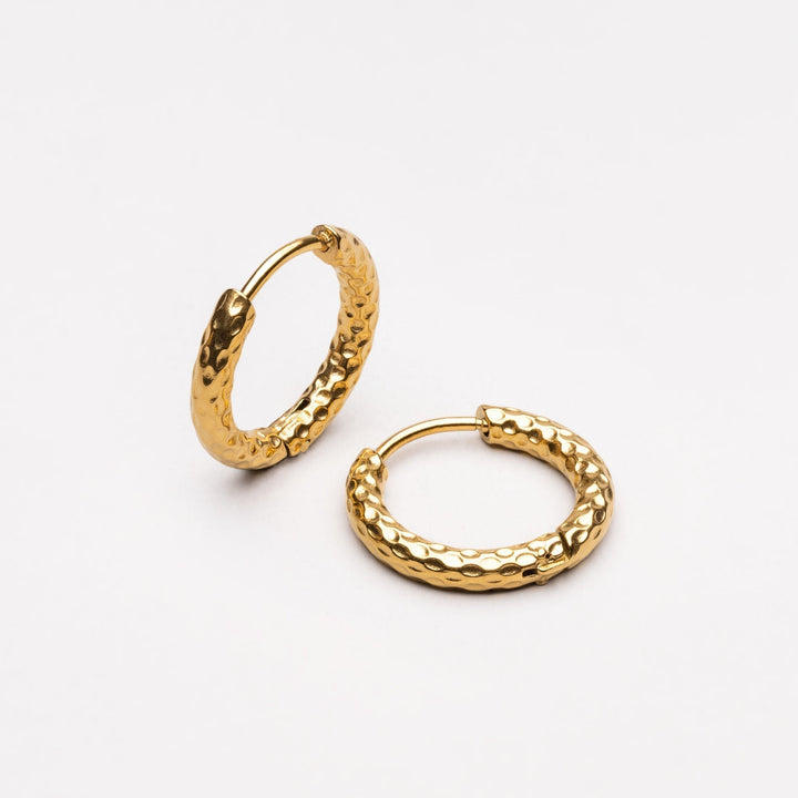 Gold plated hammered hoop earrings, hypoallergenic & waterproof women's jewelry.