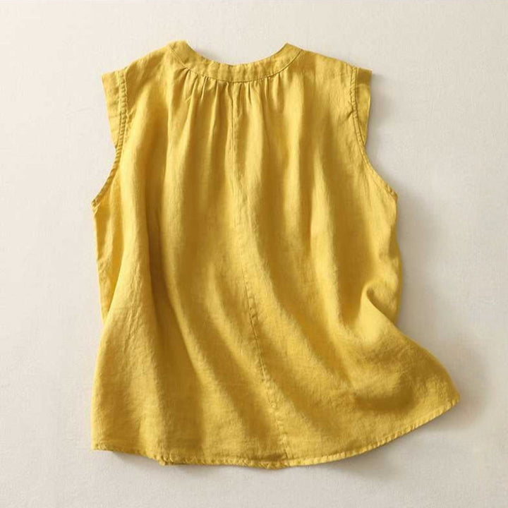 Elegant women's high collar blouse with pin-tuck front. A chic & versatile top for spring and summer fashion.