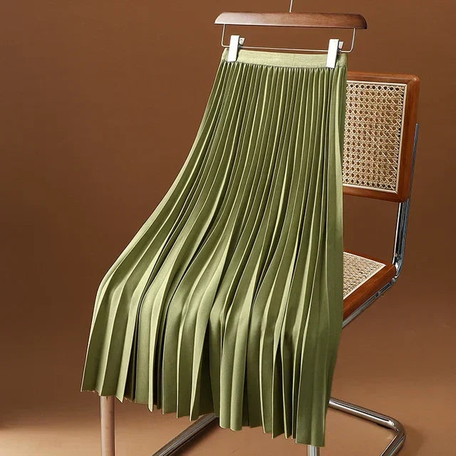 Elegant women's pleated midi skirt, high waisted design for a chic, versatile, and sophisticated fashion statement.
