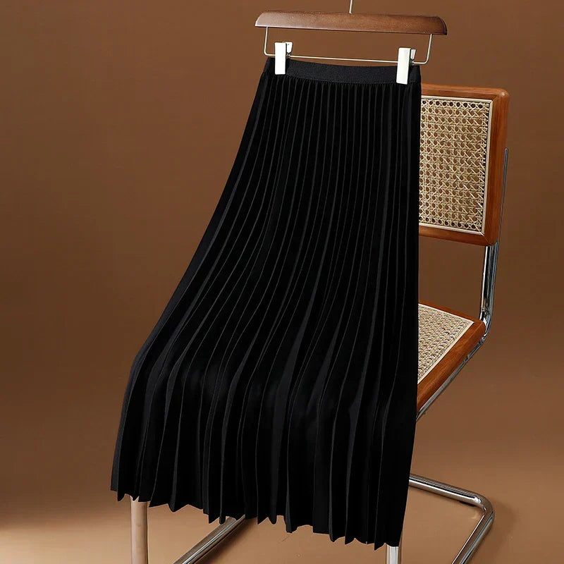 Modern classic women's high waist pleated midi skirt, elegant and flowy, perfect for chic office or dressy casual wear.