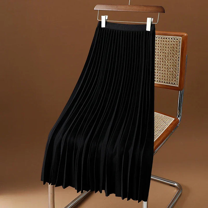 Modern classic women's high waist pleated midi skirt, elegant and flowy, perfect for chic office or dressy casual wear.