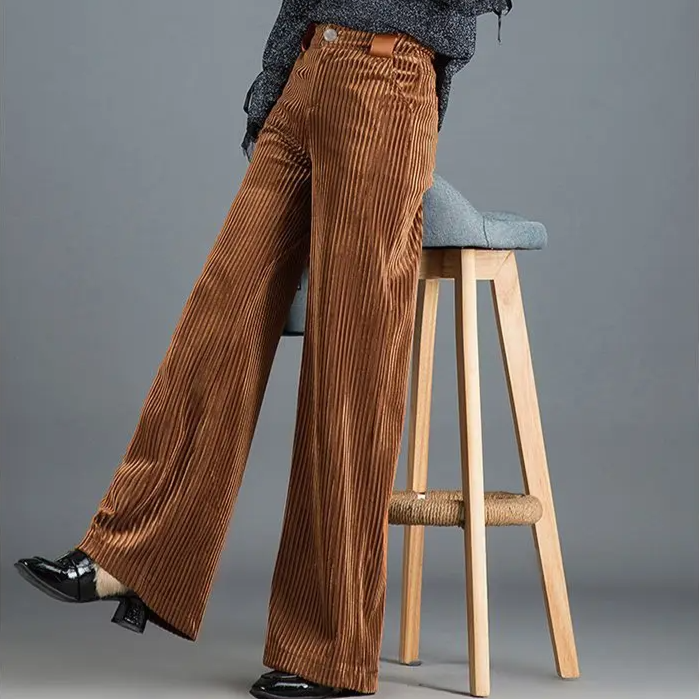 Sophisticated women's high-waisted wide-leg trousers. Achieve an elegant look for office or casual chic wear.