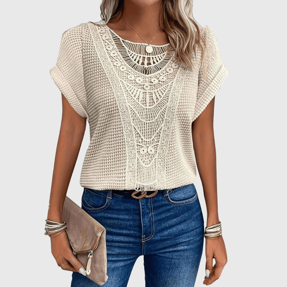 Women's elegant Ibiza style lace blouse. A fashionable top with a flattering fit for summer fashion and resort wear.
