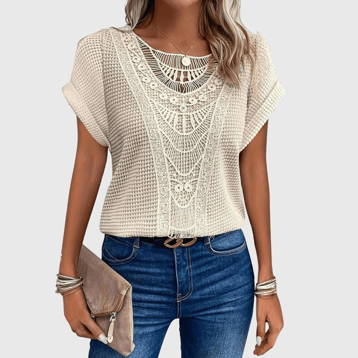 Women's elegant Ibiza style lace blouse. A fashionable top with a flattering fit for summer fashion and resort wear.
