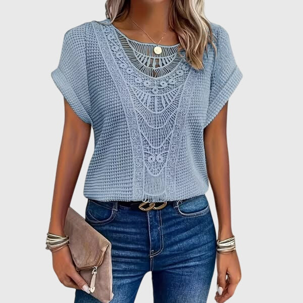 Casual chic women's lace blouse in Ibiza style, a fashionable top with a flattering fit for versatile summer fashion.