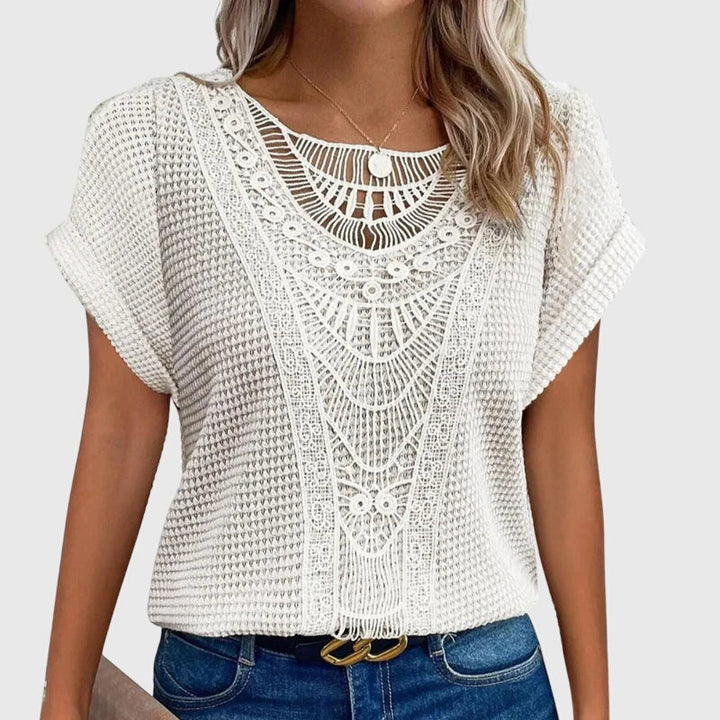 Versatile women's elegant Ibiza style lace blouse, great for various summer fashion & resort wear outfits.