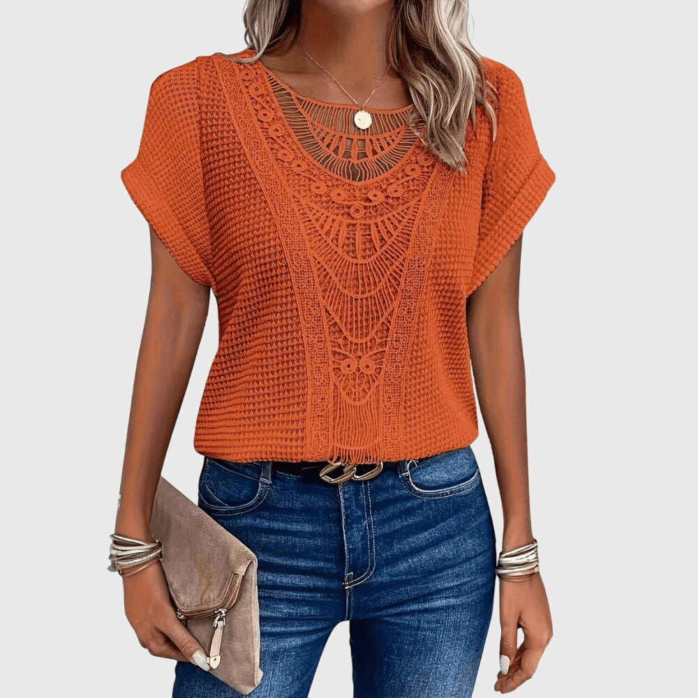 Elegant women's Ibiza style blouse from the back, showcasing subtle lace details. A casual chic top for summer.