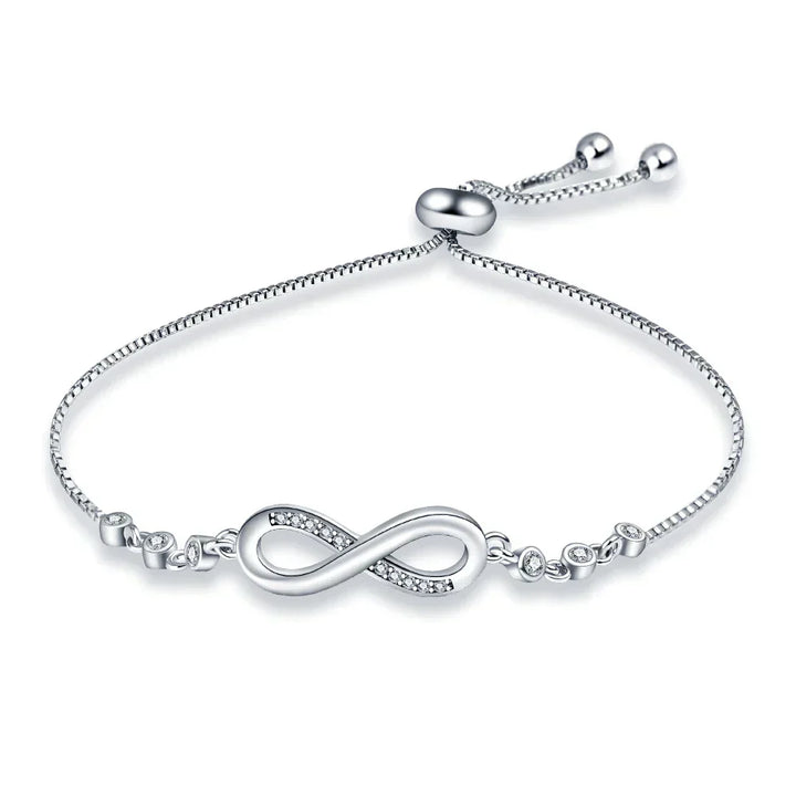 Women's elegant infinity link bracelet, crafted from polished stainless steel. Perfect adjustable fashion jewelry gift.