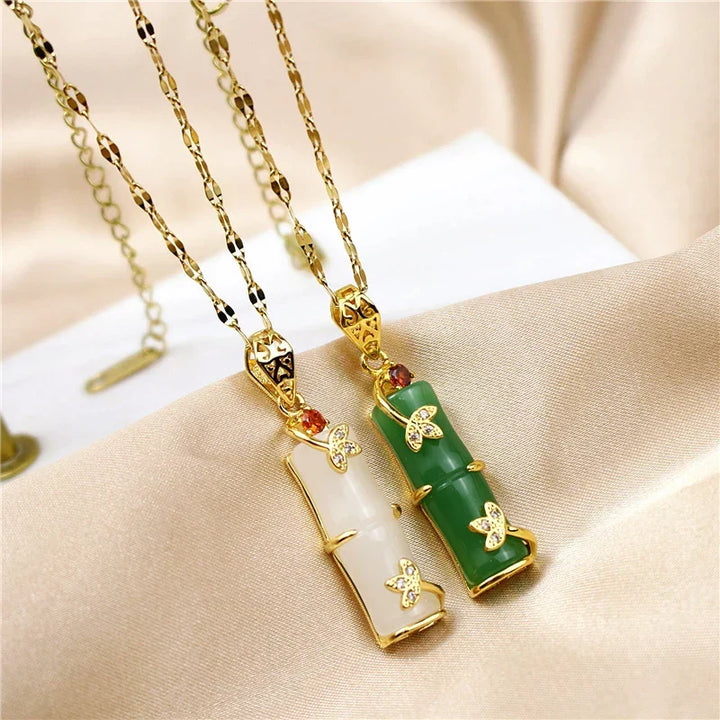 Women's elegant jade amulet necklace with a stunning green pendant.