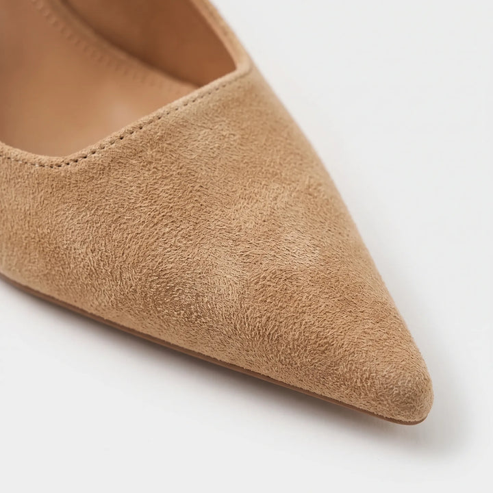 Stylish pointed toe slingback sandals for women, featuring a comfortable kitten heel for day-to-night elegance.