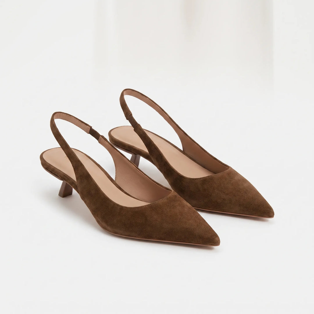 Classic women's kitten heel sandals with an elegant slingback strap, ideal as sophisticated dress shoes.
