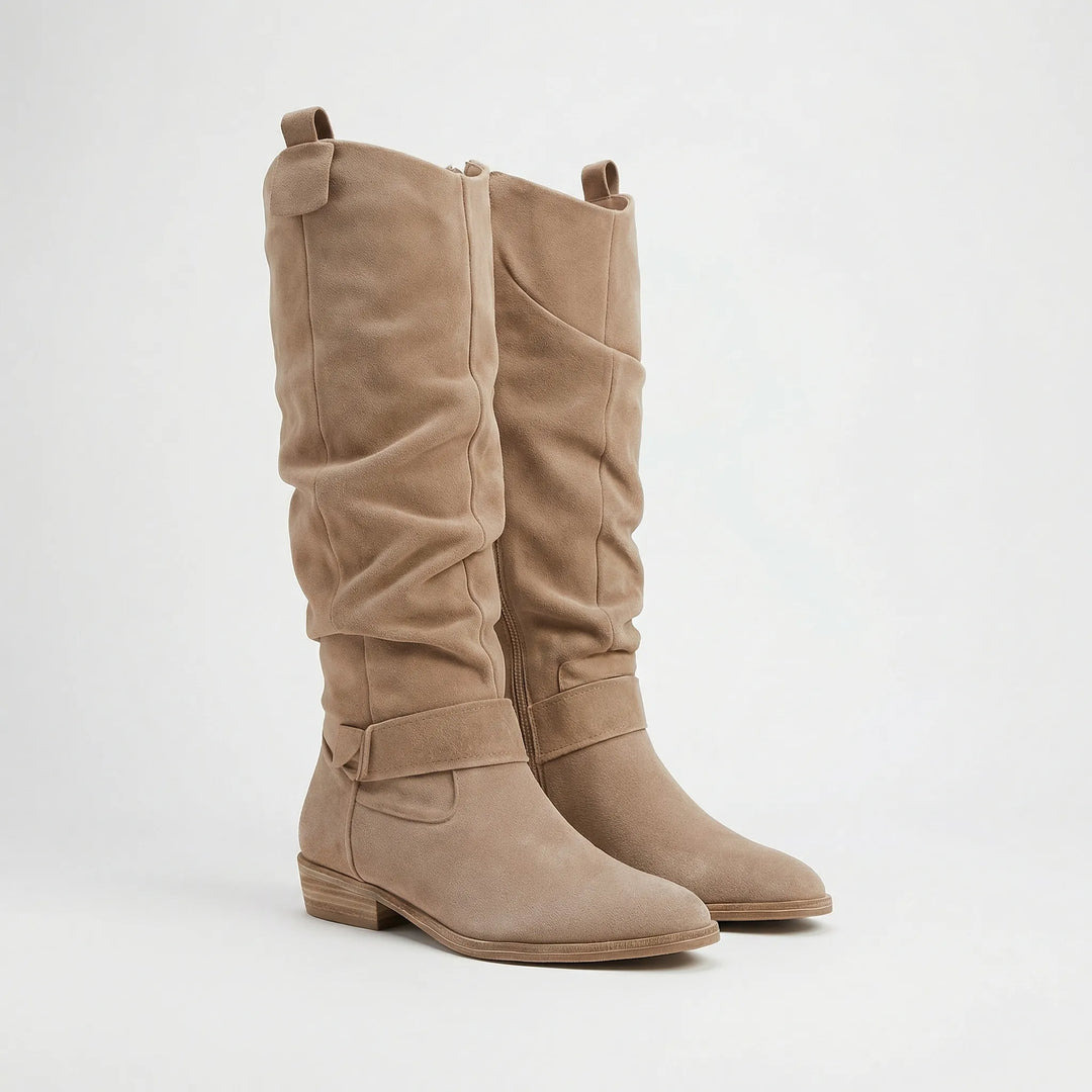 Comfortable women's winter boots, knee-high style with a low block heel and stylish side zipper detail.