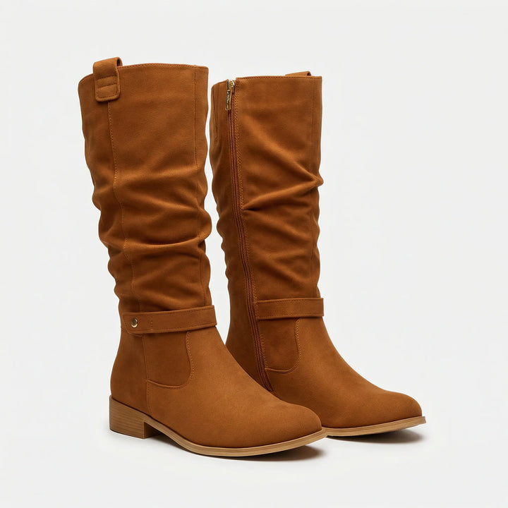 Fall fashion women's boots, knee-high "Chantal" style with a comfortable block heel and fashionable bow accent.