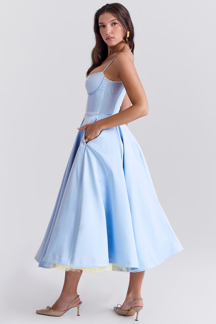 Elegant women's midi dress featuring lace-trim corset bodice, tulle hem, and practical pockets.