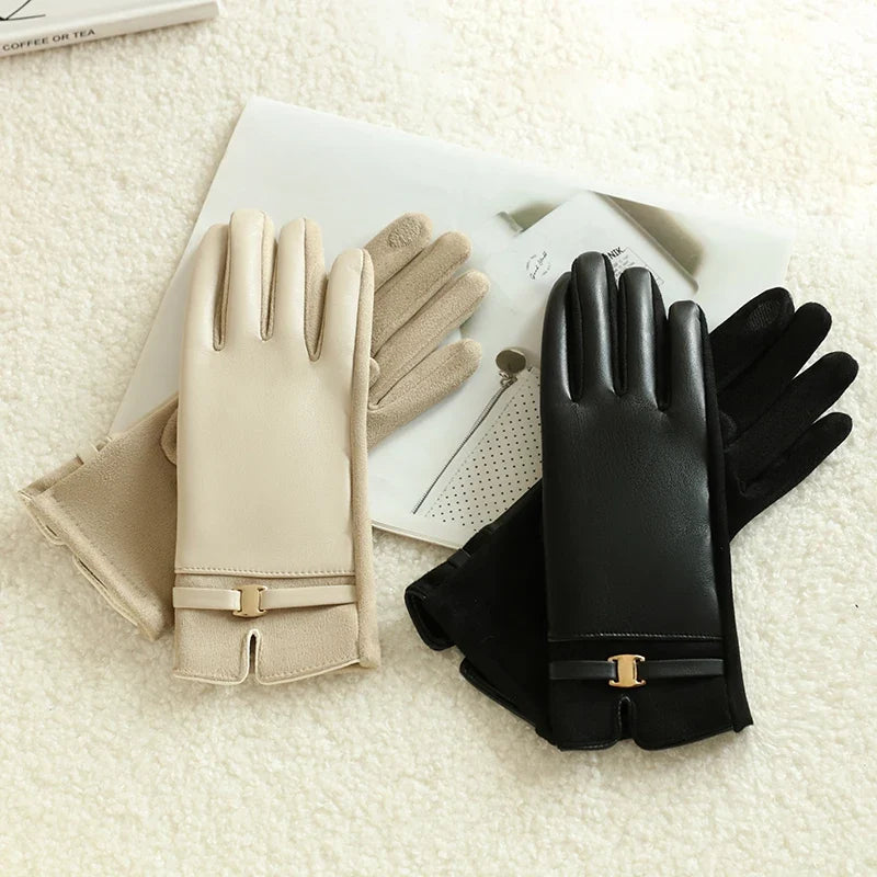 Women's elegant leather winter gloves, warm and stylish. Perfect cold weather fashion accessory.