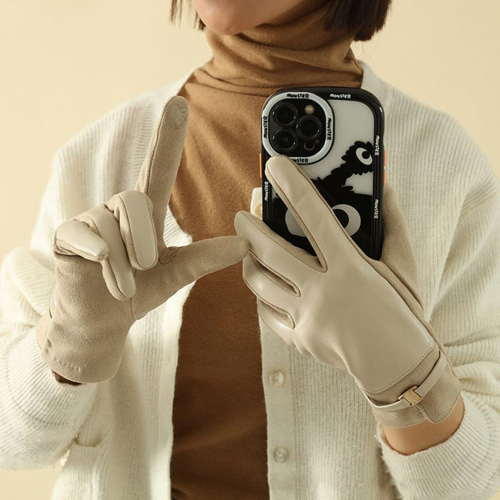 Sophisticated women's elegant leather gloves. Stay warm & fashionable this winter with premium outerwear.