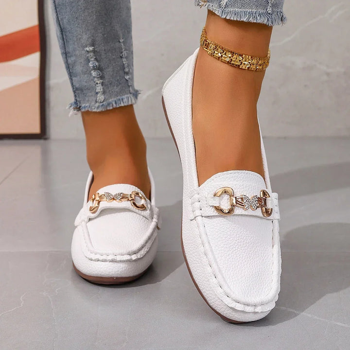Formal & casual women's loafers featuring sophisticated crystal chain detail on the vamp.
