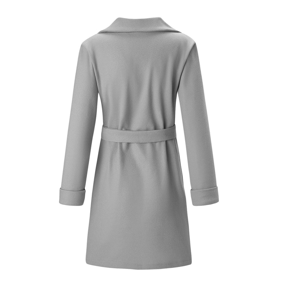 Long double-breasted women's winter coat. Elegant wool-look fabric for classic fall and winter fashion.